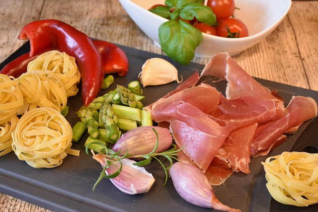 Image of Italian noodles, parma ham and selected vegetables